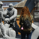 A visitor looks at a monument to firefighters who responded to the 1986 reactor explosion not far from the Chernobyl nuclear power plant on August 19, 2017 in Chornobyl, Ukraine.